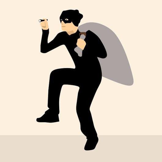 Cambrioleur vêtu de noir